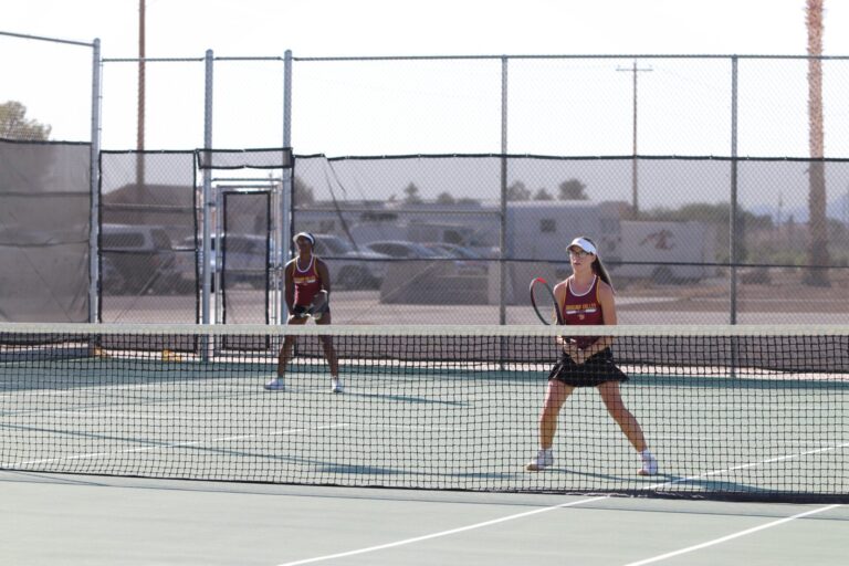 Lady Trojans Defeat Sloan Canyon 14-4 in Regional Tennis Match