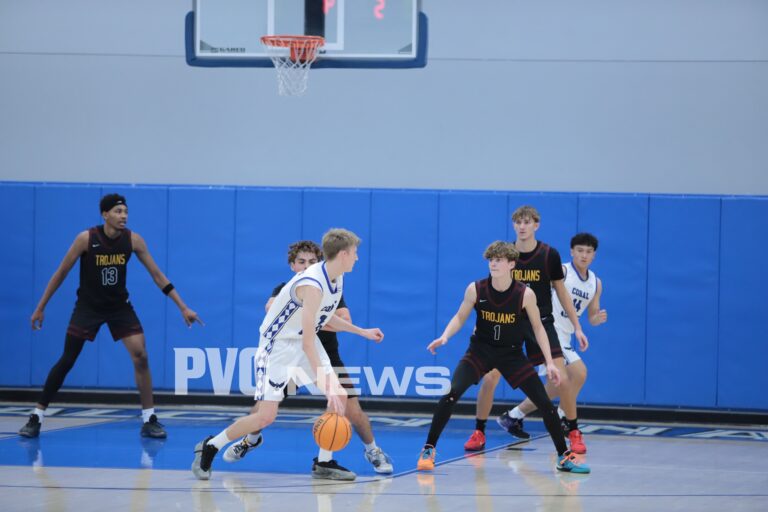Trojans Battle Hard in Loss to CASLV Falcons