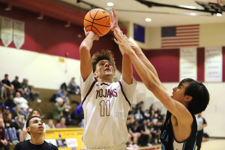 Trojans Boys’ Basketball Battle Hard in Thrilling Matchup Against Sloan Canyon