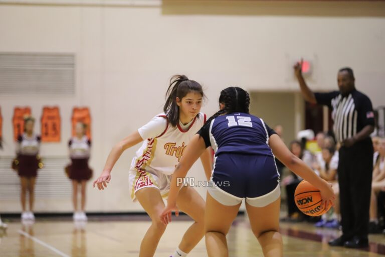 Lady Trojans Show Teamwork in Tough Match Against Mustangs