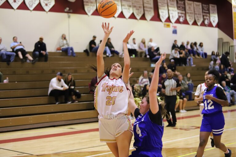 Lady Trojans Secure Hard-Fought Victory Against Coral Academy Falcons