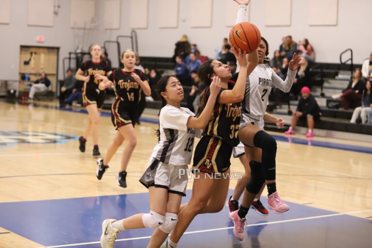 Lady Trojans Dominate Pinecrest Academy with Strong Team Effort in 59-33 Victory